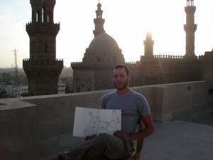Damon drawing on rooftop overlooking Sultan Hasan Mosque Photo Kerrie Guy